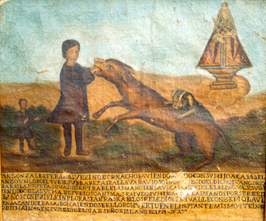 La Ermita de los Remedios, en Hornachos (Badajoz), alberga este exvoto en forma de lienzo sobre la intercesión de la Virgen en la muerte de un lobo rabioso.